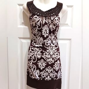 Sexy slip on print dress Size Small with stretch  it fits up to a 7/8.